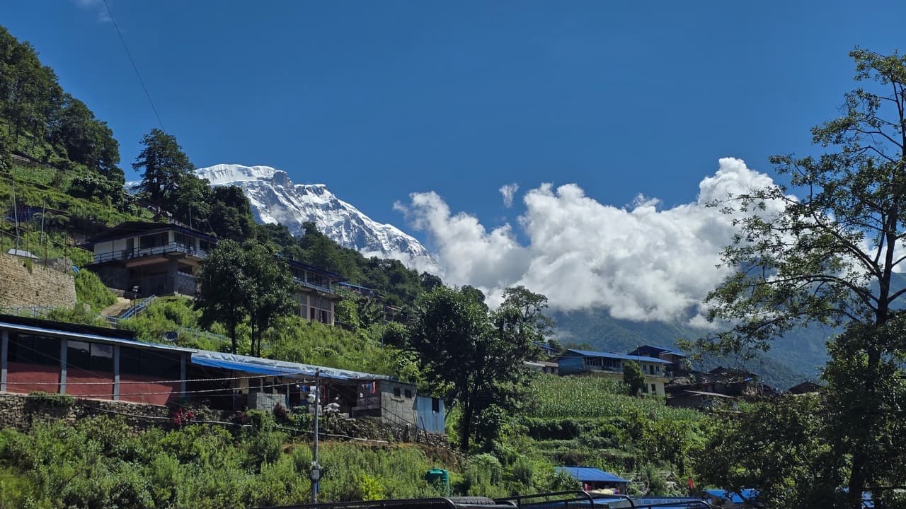 River flowing through the green hills of Nepal